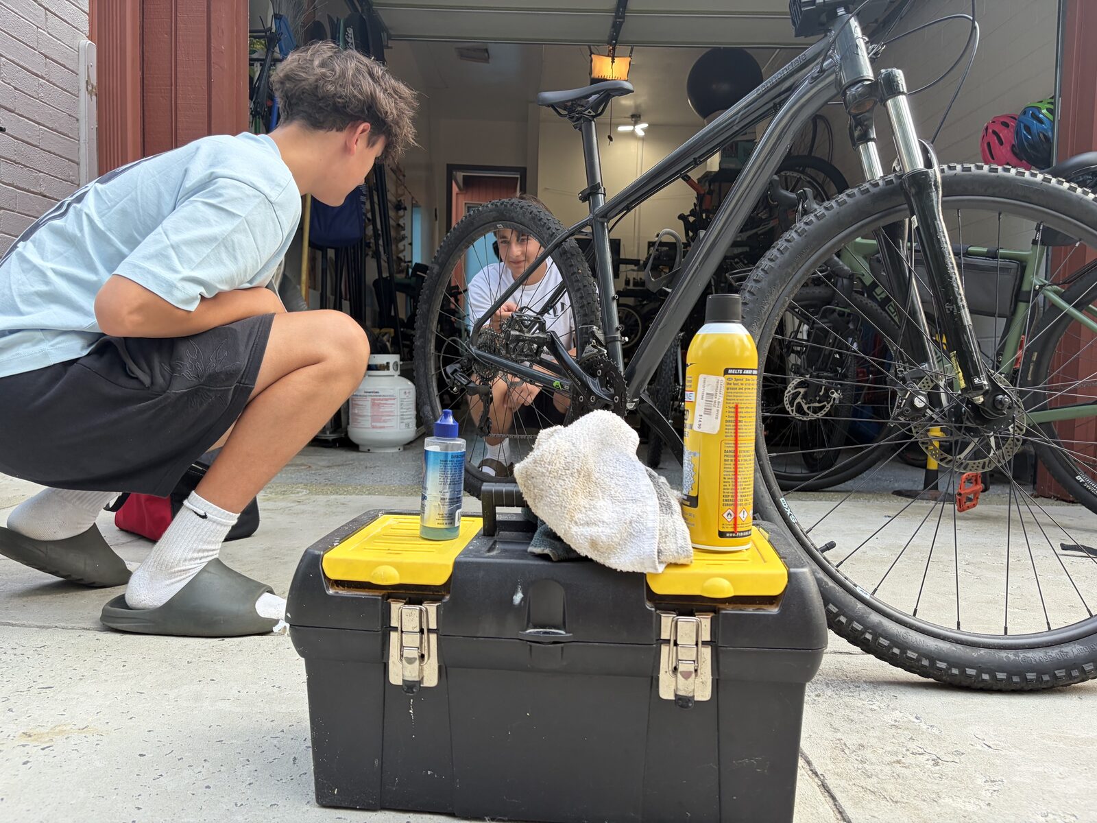 A Success Cycles student fixing up a donated bike